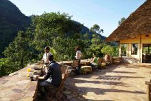 Breakfast on the patio at Volcanoes Bwindi Lodge, Bwindi Impenetrable Forest, Uganda