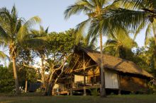 The bungalows sit amid the swaying palms at Pole Pole Bungalow Resort, Mafia Island, Tanzania