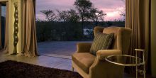 Recline in comfortable chair and admire the sunset at Chitwa House, Sabi Sands Game Reserve, South Africa