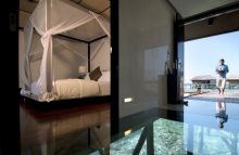 The suites at Kuredu Island Resort, Lhaviyani Atoll, Maldives have unique glass floors so guests can view the stunning blue waters underneath their private suites.