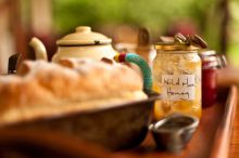 Food is local and fresh, such as just-baked bread and delectable Wild Mara Honey at Mara House, Masai Mara National Reserve, Kenya (photo by Simon Urwin)