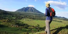 Hiking for a view of the volcano at Mount Gahinga Lodge, Mgahinga National Park, Uganda