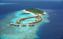A view of the private suites from above at Kuredu Island Resort, Lhaviyani Atoll, Maldives