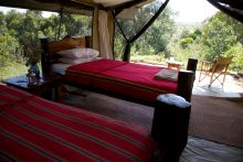 Twin tent interior at Offbeat Mara Camp, Masai Mara National Reserve, Kenya