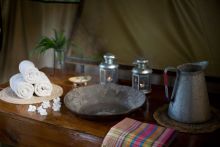 A pitcher and basin for washing up at Offbeat Mara Camp, Masai Mara National Reserve, Kenya