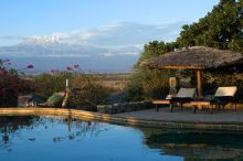 The pool with sun loungers for relaxation at KIA Lodge, Arusha, Tanzania