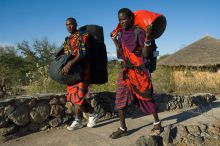 The friendly staff carrying guest bags to their rooms at KIA Lodge, Arusha, Tanzania