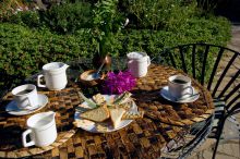 Breakfast and coffee in the sunshine at KIA Lodge, Arusha, Tanzania