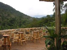 The main deck with a view of the forest at Engagi Lodge, Bwindi Impenetrable Forest, Uganda