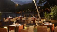 Outdoor evening dining by the beach at Le Meridien Fishermans Cove, Mahe, Seychelles
