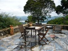 Outdoor dining at Virunga Lodge, Volcanoes National Park, Uganda (Mango Staff photo)
