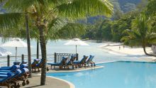 Pool with the nearby beach at Le Meridien Fishermans Cove, Mahe, Seychelles