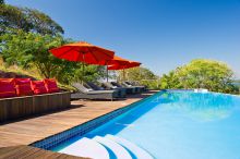 Enjoy the sun by the pool at Pumulani, Lake Malawi, Malawi