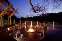 Rhino Post Safari Lodge - Deck in the Evening