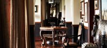 Unique decor blending Victorian and African artifacts at Singita Sasakwa Lodge, Grumeti Reserves, Tanzania