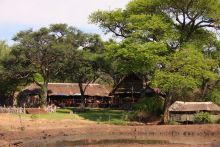 View of the grounds from the river at Elephant Valley Lodge, Chobe National Park, Botswana