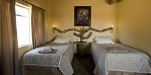 The guestrooms at Grasslands Bushman Lodge, Central Kalahari Game Reserve, Botswana