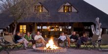 The outdoor campfire lounge area at Grasslands Bushman Lodge, Central Kalahari Game Reserve, Botswana